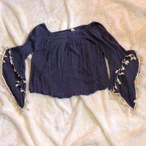 off the shoulder/tassels,used, in good condition